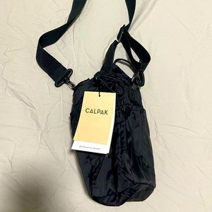 Never used Calpak water bottle bag and purse combo